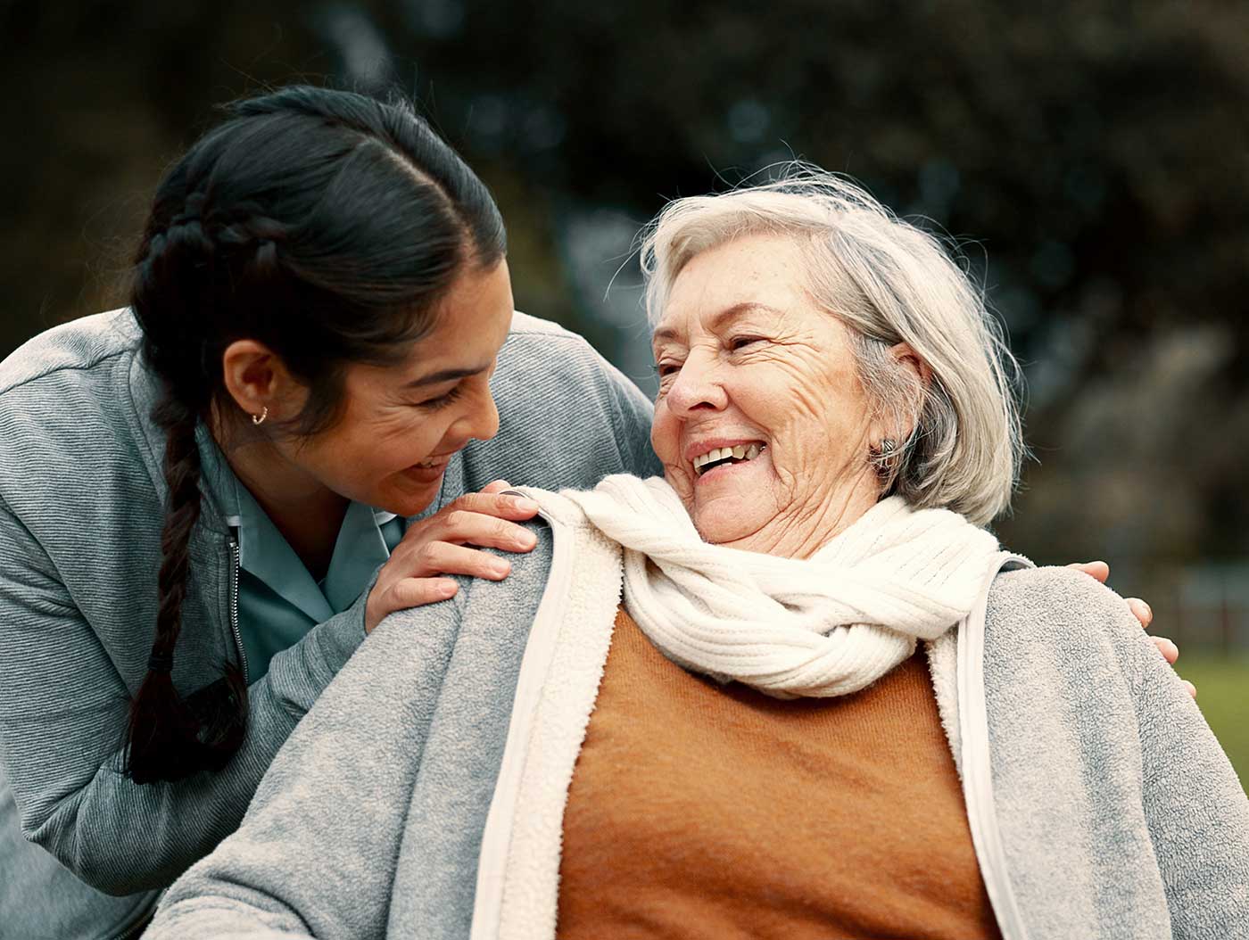 View of Elder and Youth Smiling